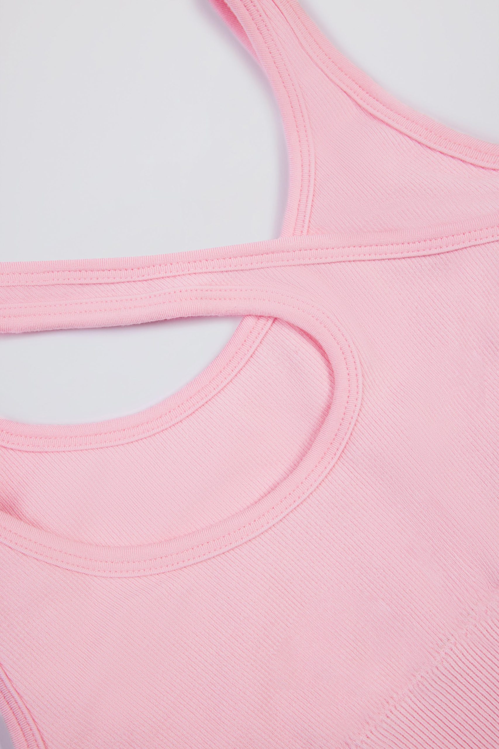 Seamless Soft Rib Asymmetric Sports Bra in Powder Pink - Image 6