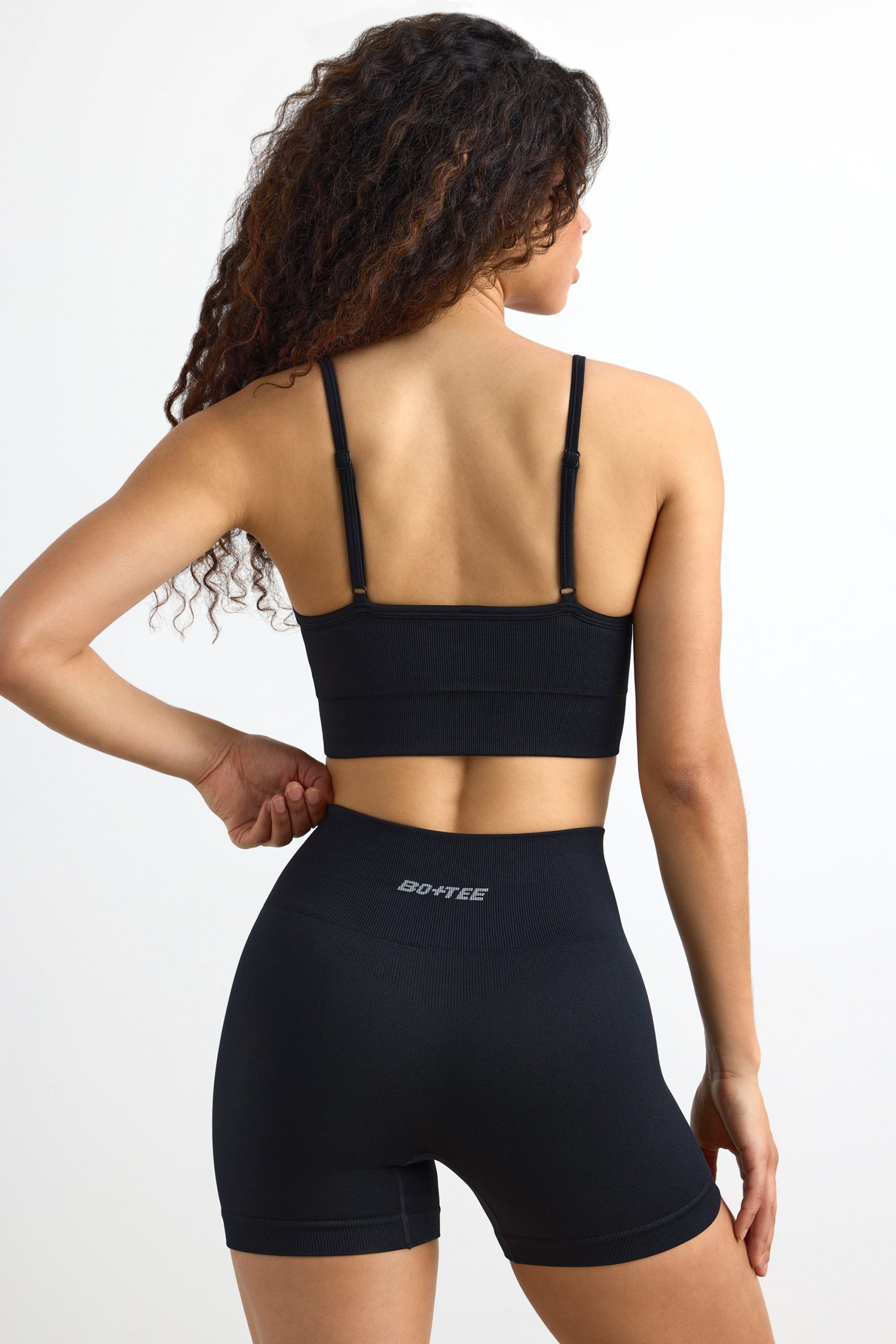 Super Sculpt Seamless Mini Shorts in Black - Image 5