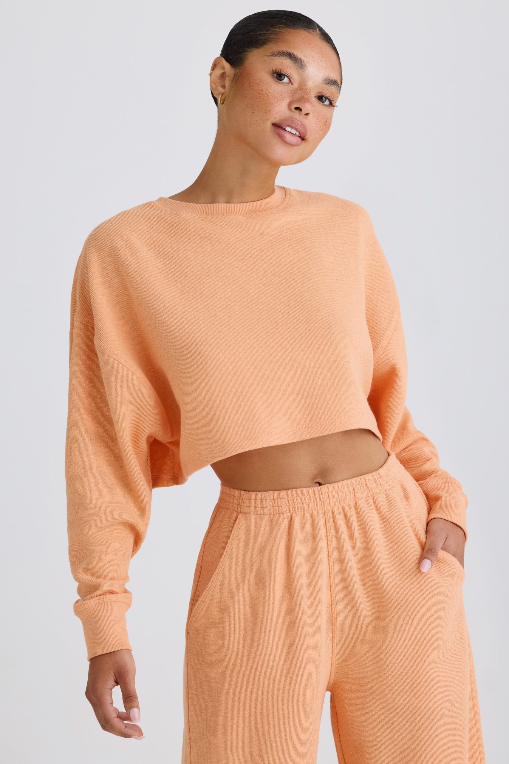 Textured Cotton Jersey Open-Back Cropped Sweatshirt in Peach - Image 2