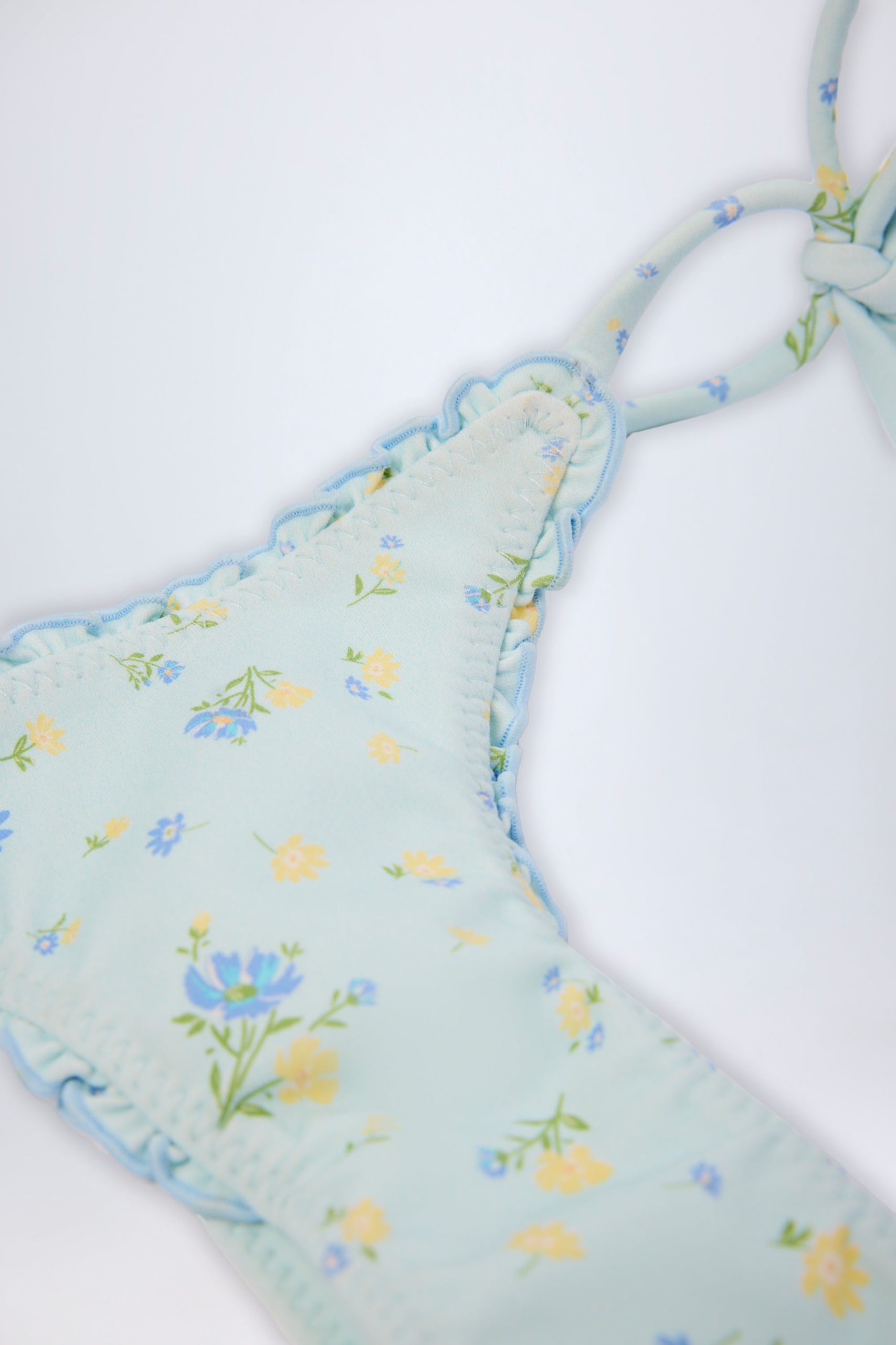 Side-Tie Thong Bikini Bottoms in Blue Floral - Image 5