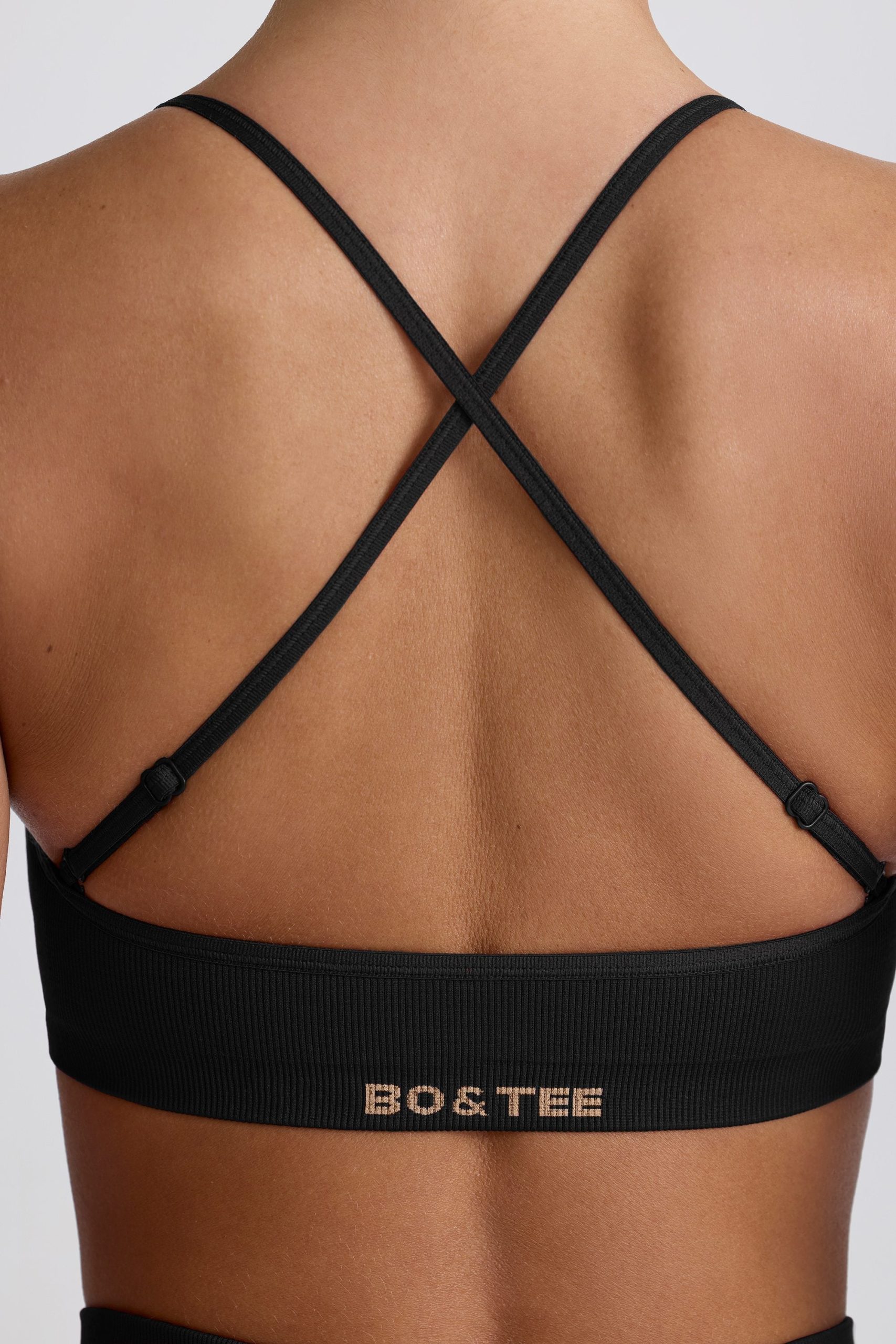 Super Sculpt Seamless Cross-Back Sports Bra in Black - Image 5
