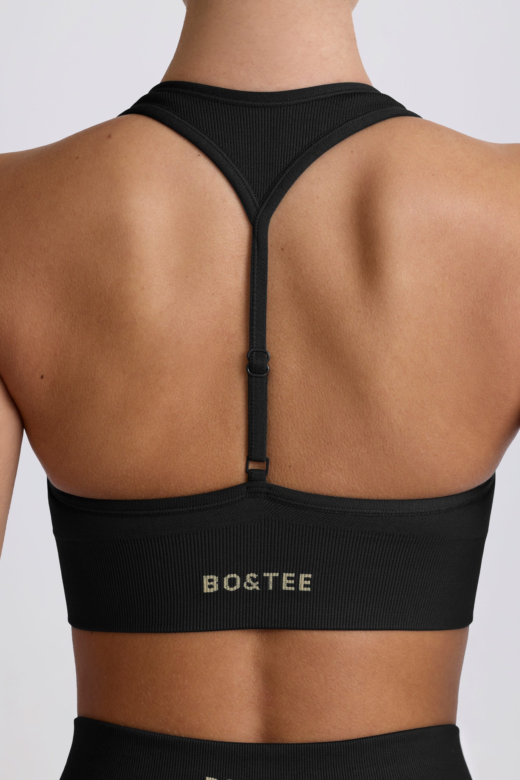 Super Sculpt Seamless T-Back Sports Bra in Black - Image 5